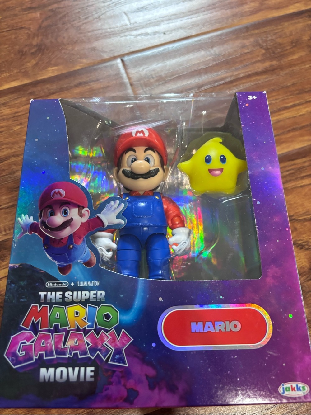 Nintendo Mario Figure with Red Hat, Blue Overalls and Yellow Star